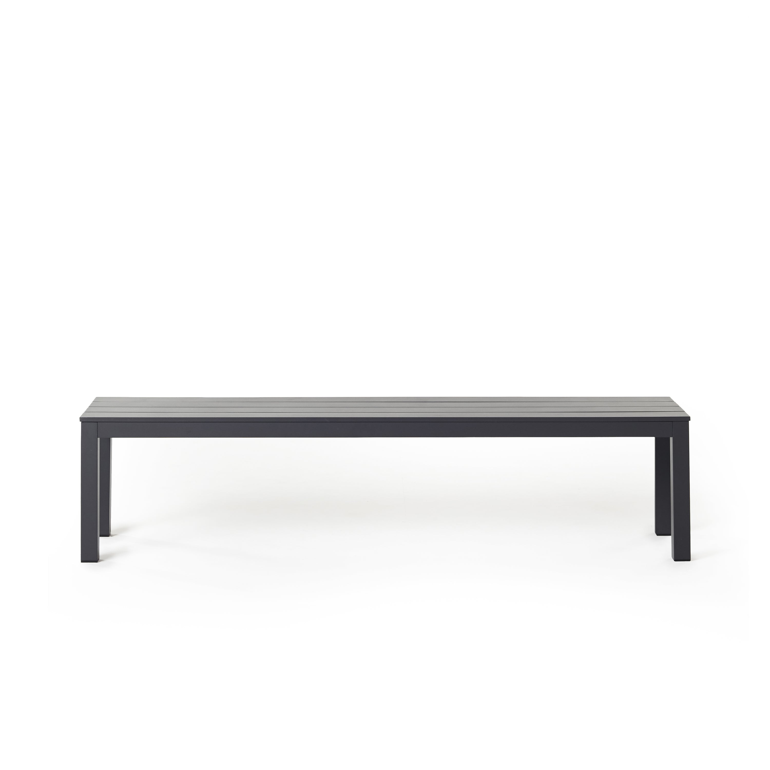 Belvedere Backless Dining Bench by Terra Outdoor Living, crafted from durable aluminum with a modern, streamlined slatted design, featuring clean architectural lines and an airy silhouette for versatile outdoor seating.