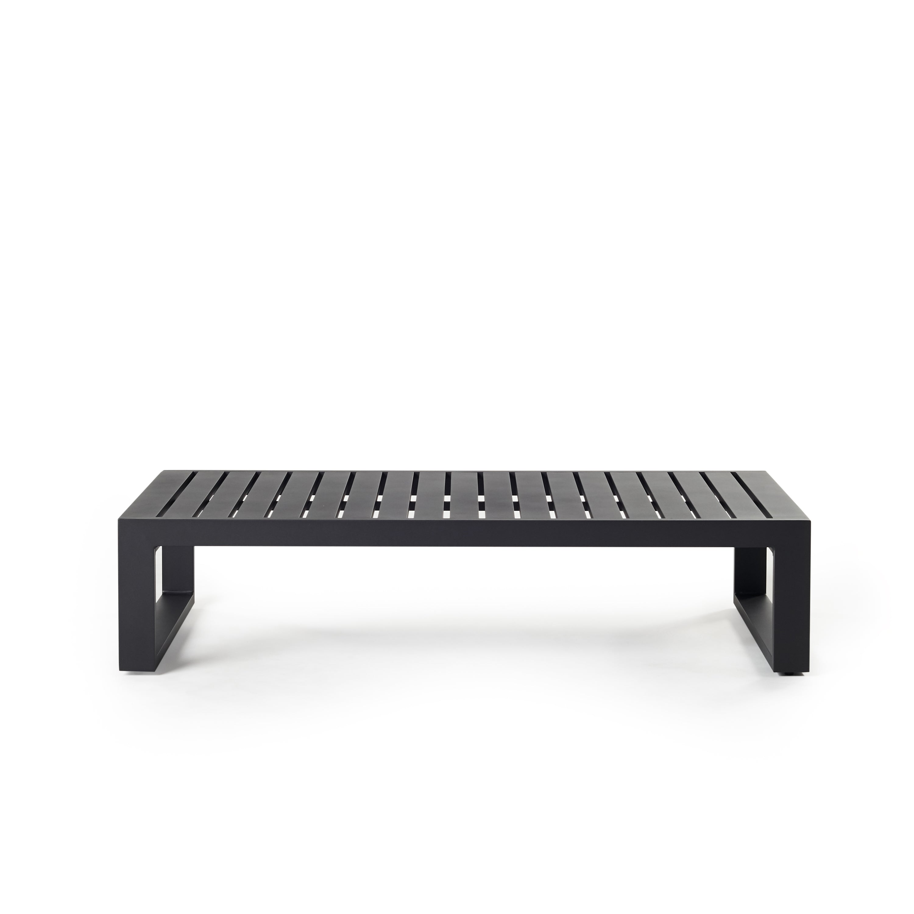 Belvedere Coffee Table by Terra Outdoor Living, crafted from durable powdercoated aluminum in a 'Charcoal' color, features architectural lines, a slatted top for easy drainage sled-style legs, and a lightweight frame that complements the collection’s modern, low-profile seating.