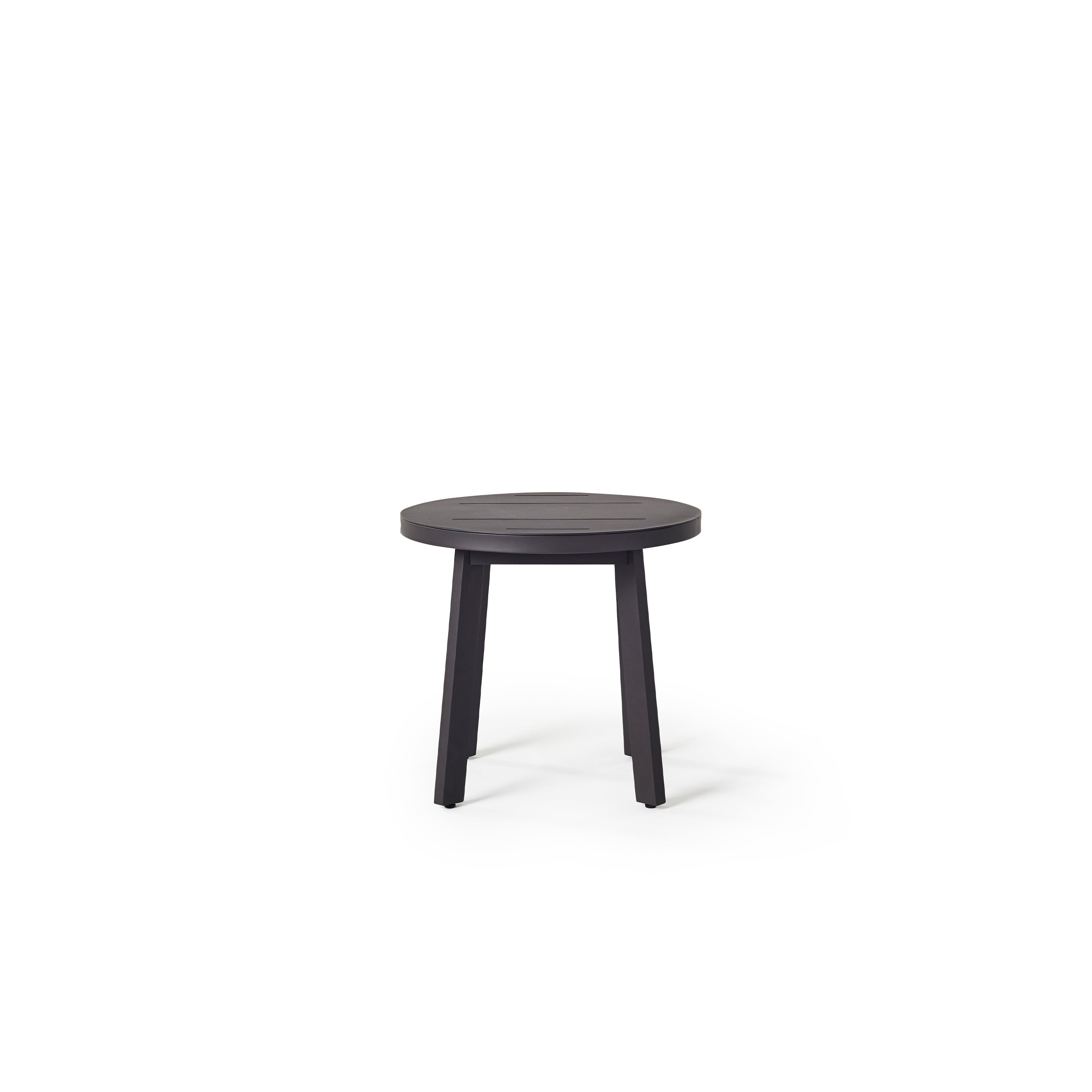 The Cavallo Round Side Table in Charcoal Aluminum by Terra Outdoor Living is a sleek all-aluminum side table, with a round slatted top atop 4 subtly angled straight-edged legs.