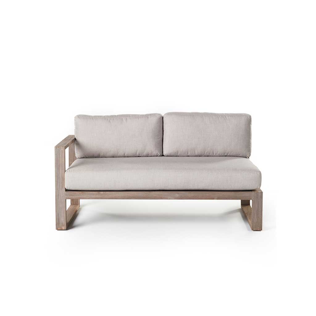 Belvedere Sectional Right Arm Loveseat by Terra Outdoor Living, featuring a low-profile, modern weathered teak frame with thick cushions, architectural lines, and airy proportions for relaxed outdoor living. Single arm rest is on right-hand side as seated, other side is open for sectional configuration.