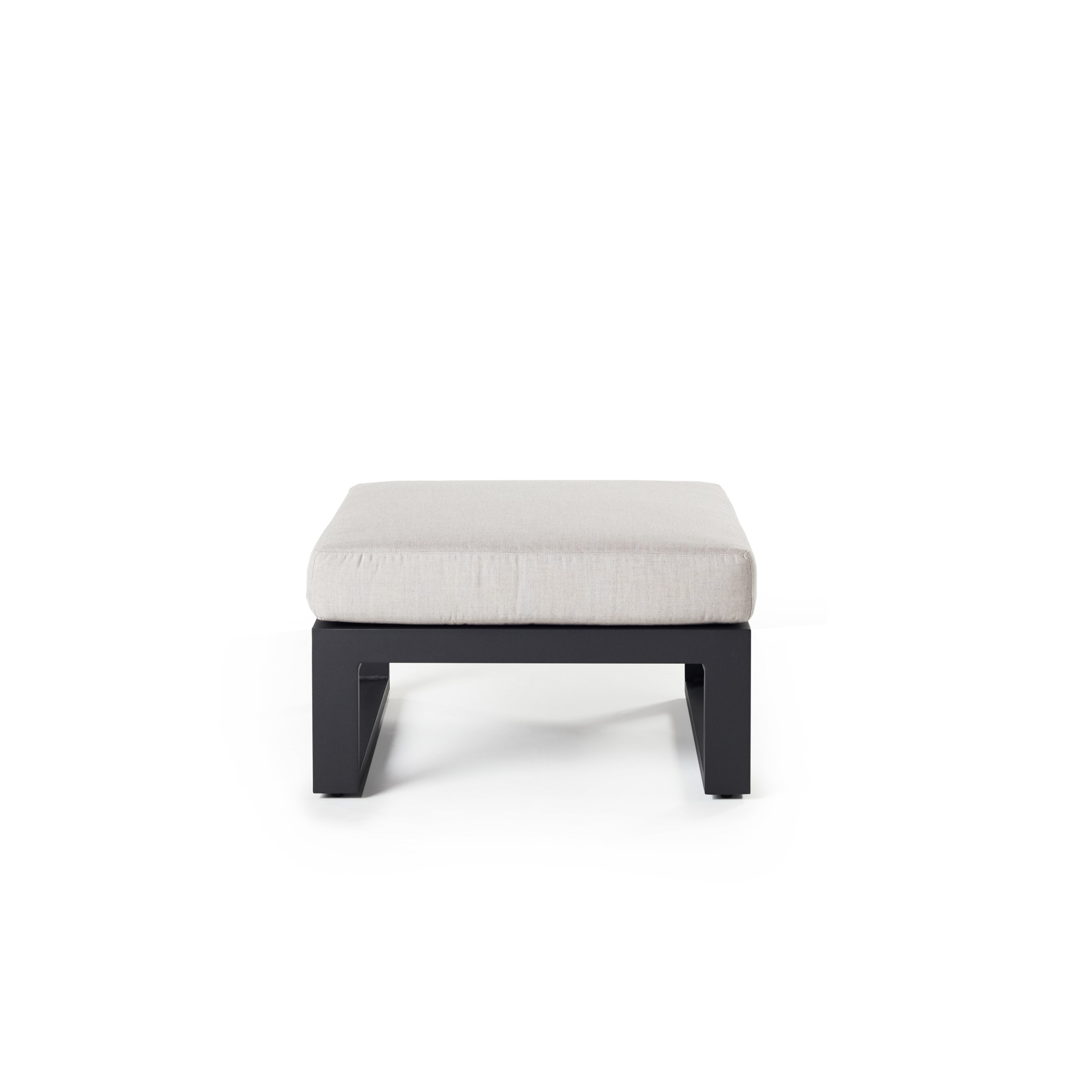 Belvedere Ottoman in Charcoal Aluminum by Terra Outdoor Living features a low-profile, durably finished aluminum frame paired with a thick weather friendly cushion —designed for use as a footrest or extra seating and to integrate seamlessly with other Belvedere seating components.