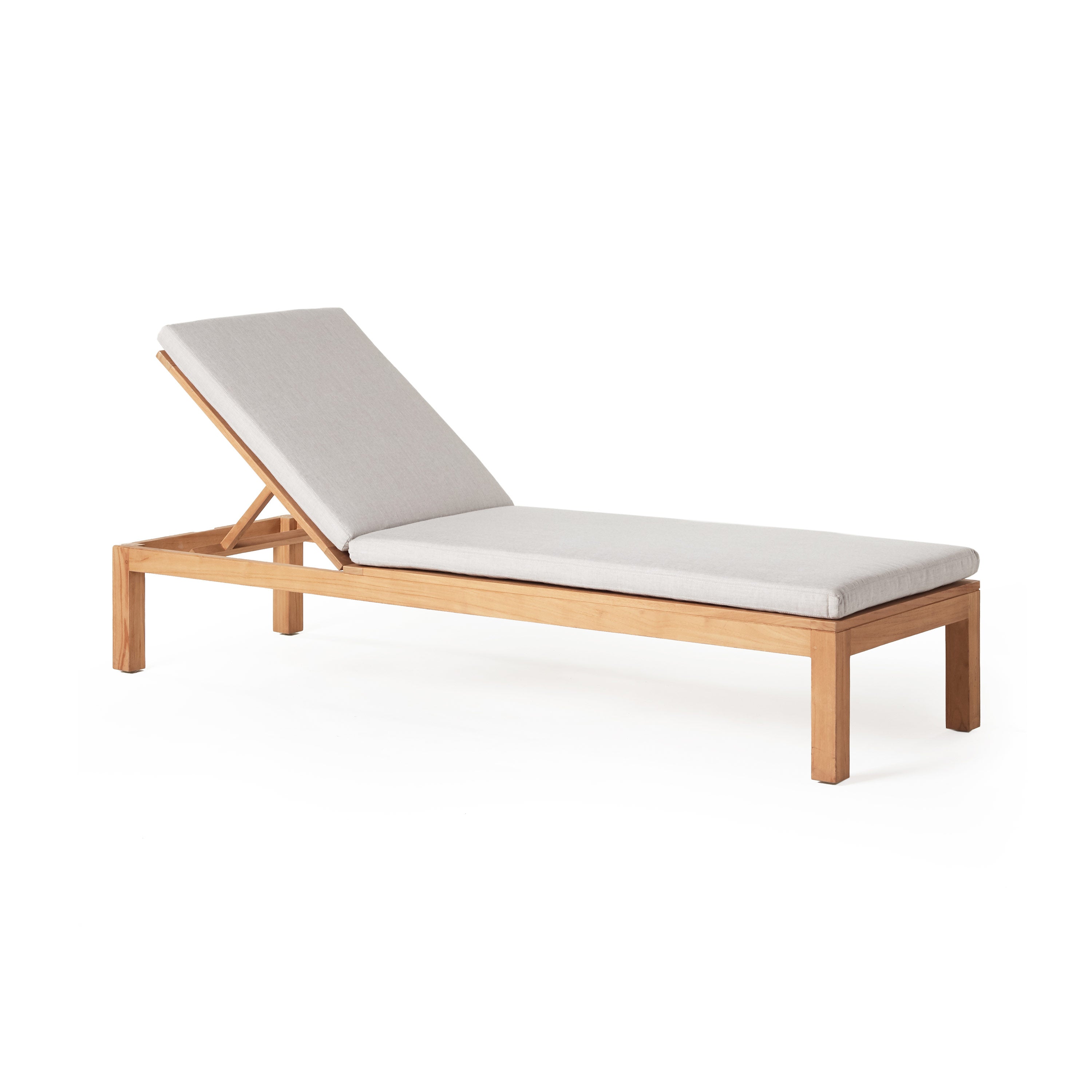 Belvedere Teak Chaise Lounge by Terra Outdoor Living, made from solid premium teak and weather-friendly cushions, features a low-slung silhouette and reclines to 7 positions—including fully flat—for deep comfort and timeless outdoor lounging.