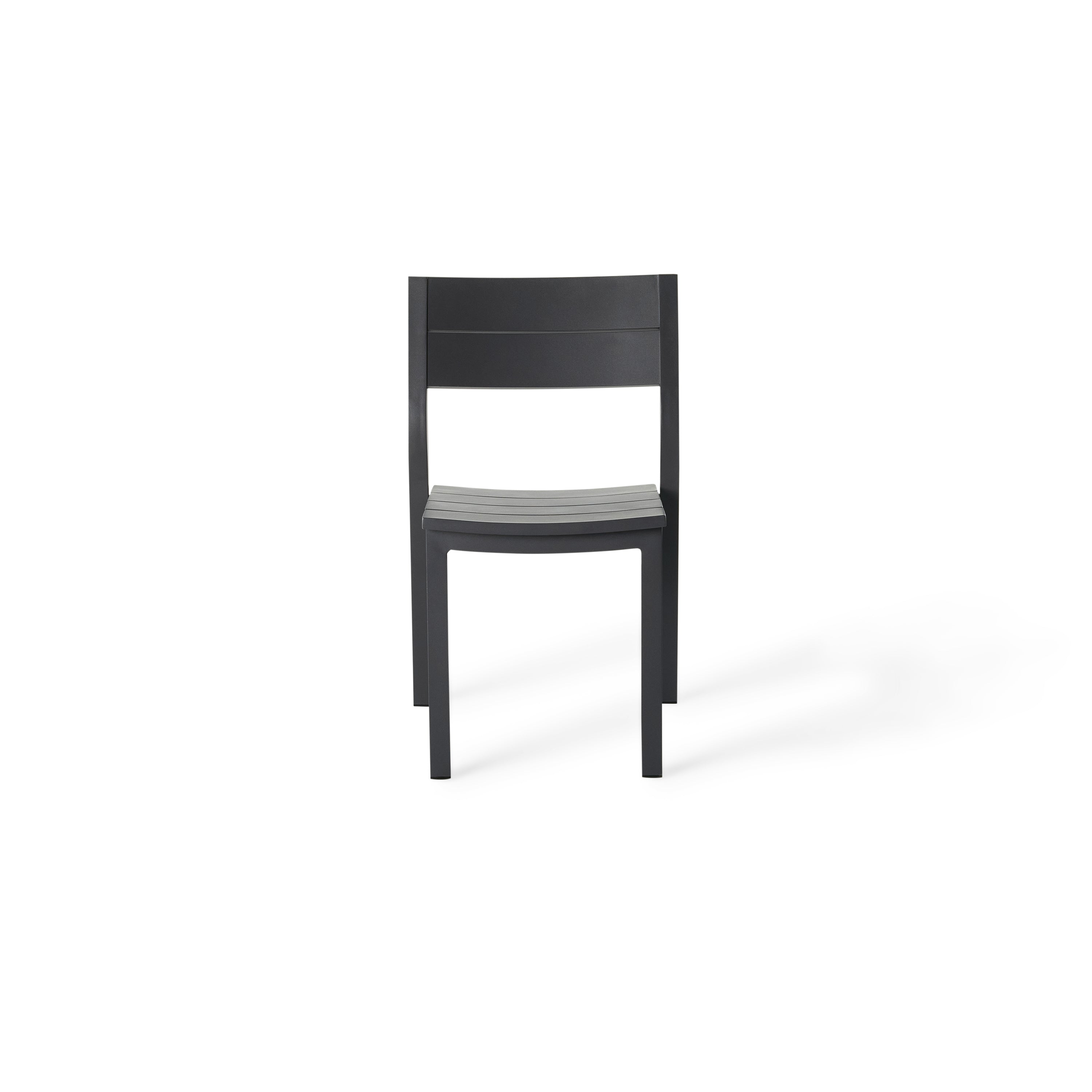 Belvedere Dining Side Chair in Charcoal by Terra Outdoor Living combines expertly crafted aluminum and durable finishes with a slightly scooped seat and flared back for enhanced comfort, plus a stackable design for easy, compact storage.