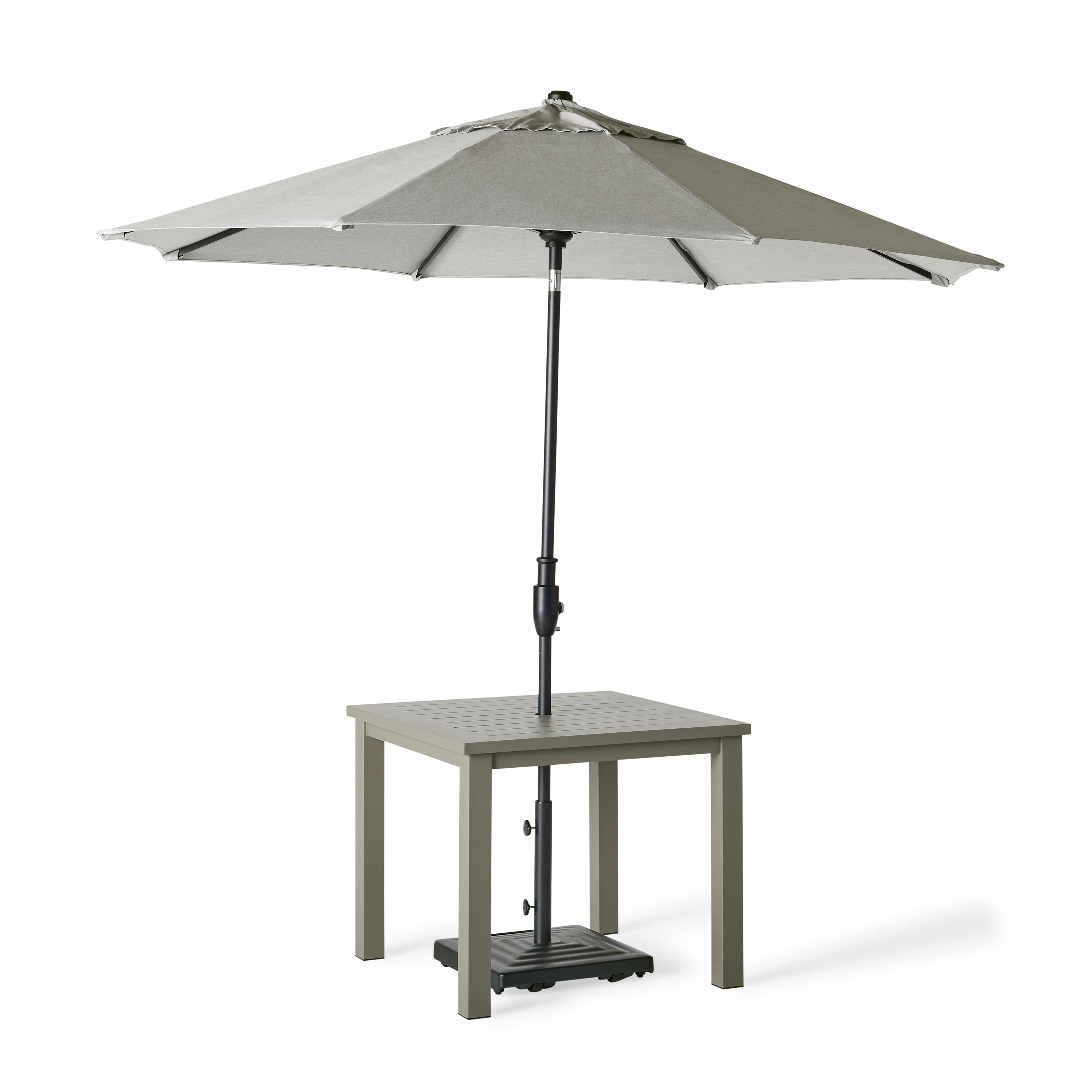 Belvedere Square Dining Table by Terra Outdoor Living in Quartz Grey, a warm grey tone, shown with a slatted aluminum top and central umbrella hole, featuring a clean-lined, modern silhouette in a compact size for versatile outdoor placement. Shown with umbrella fitted through hole to demonstrate functionality.