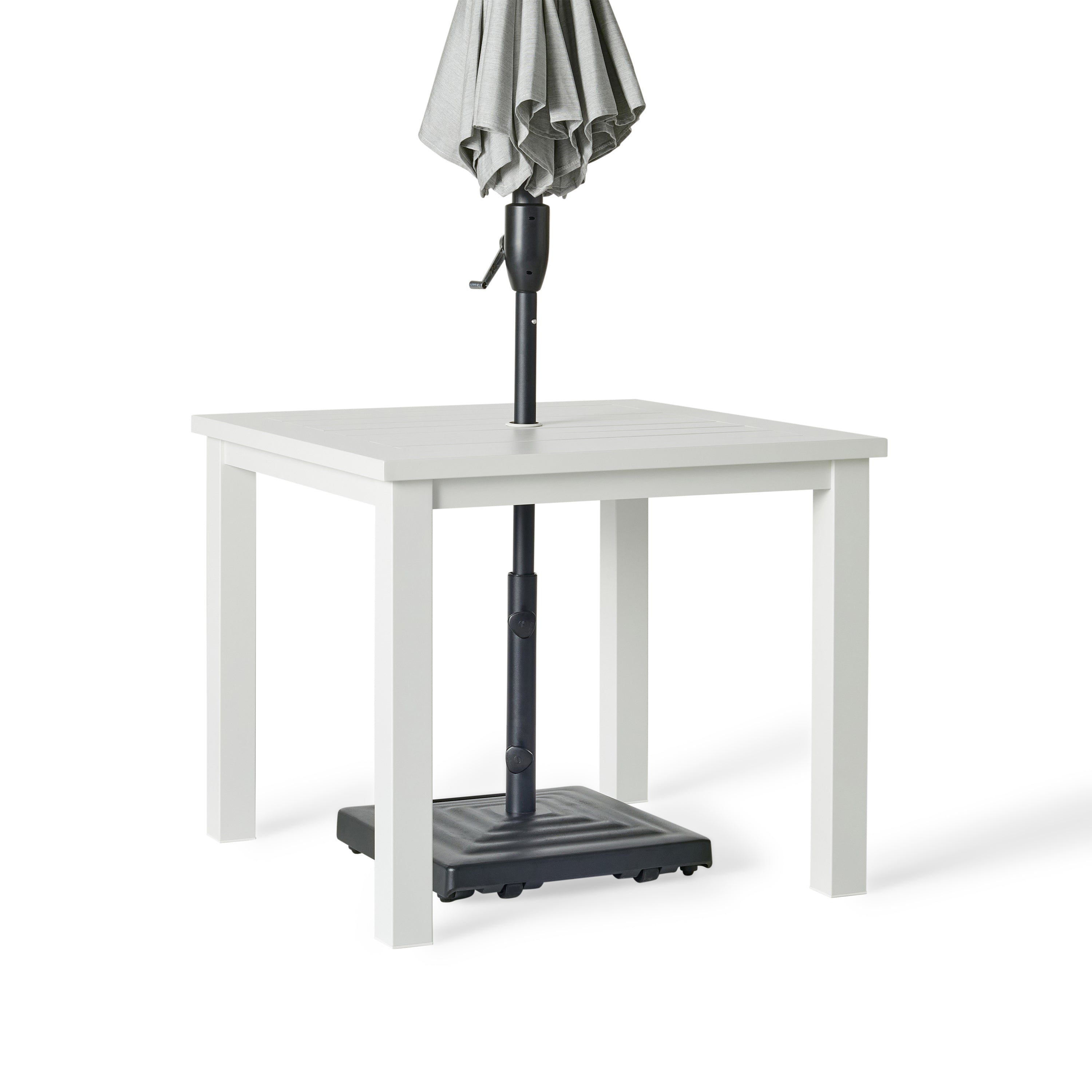 Belvedere Square Dining Table by Terra Outdoor Living in White, shown with a slatted aluminum top and central umbrella hole, featuring a clean-lined, modern silhouette in a compact size for versatile outdoor placement. Shown with an umbrella fitted through the hole to demonstrate functionality.