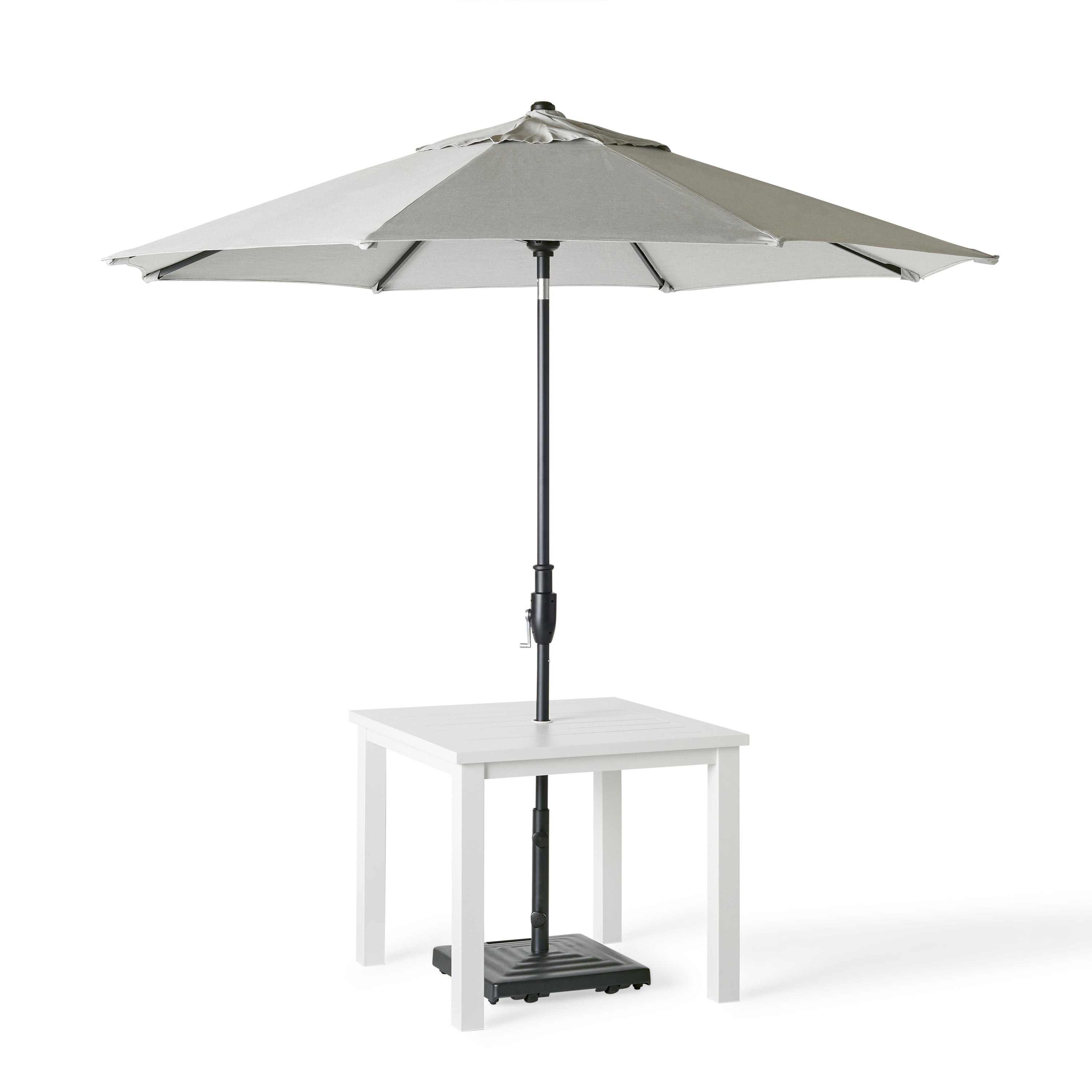 Belvedere Square Dining Table by Terra Outdoor Living in White, shown with a slatted aluminum top and central umbrella hole, featuring a clean-lined, modern silhouette in a compact size for versatile outdoor placement. Shown with an umbrella fitted through the hole to demonstrate functionality.