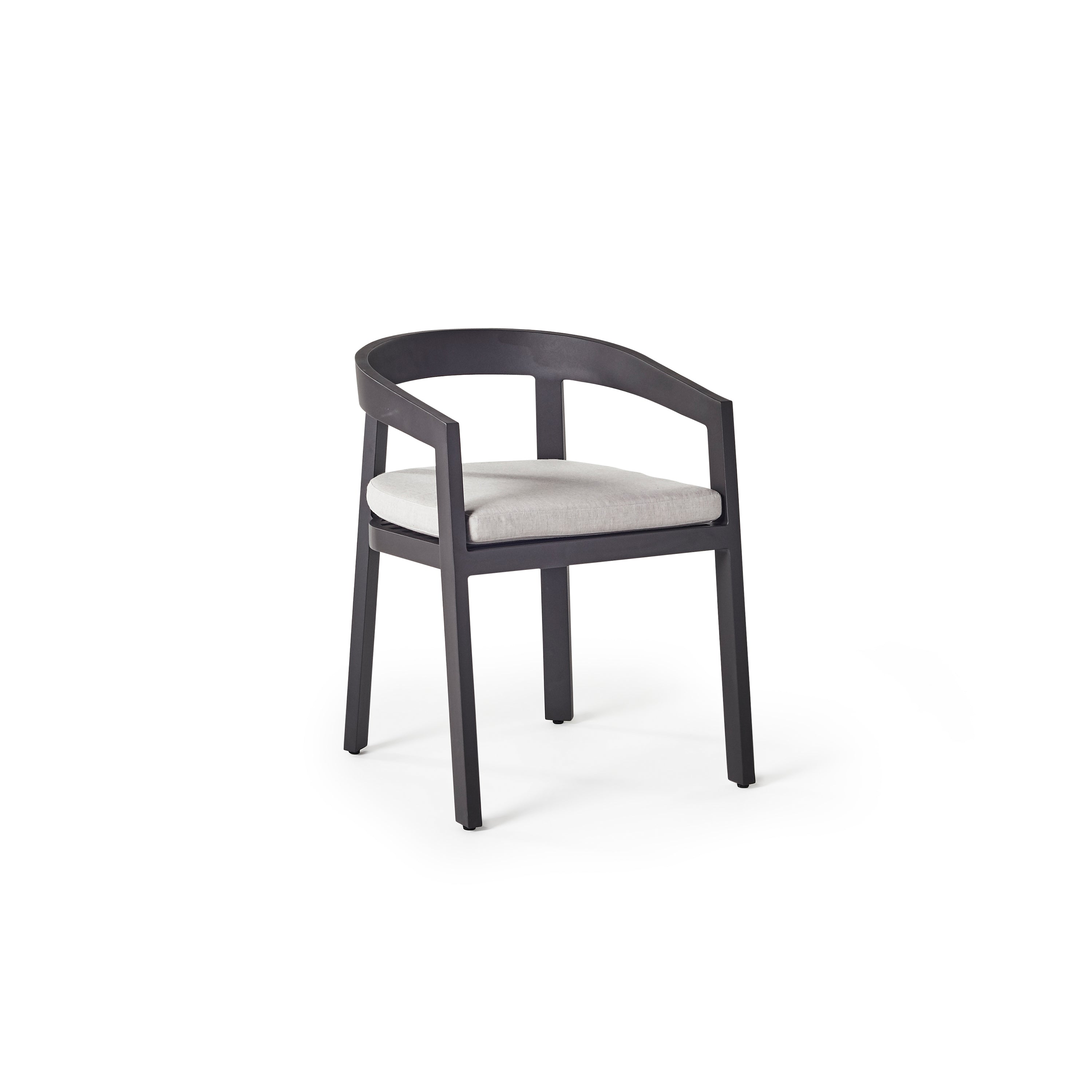 Cavallo Dining Chair in Charcoal Aluminum by Terra Outdoor Living features rustproof aluminum and a sweeping curved back, with a weather-resistant Sunbrella® cushion for luxurious outdoor dining comfort.
