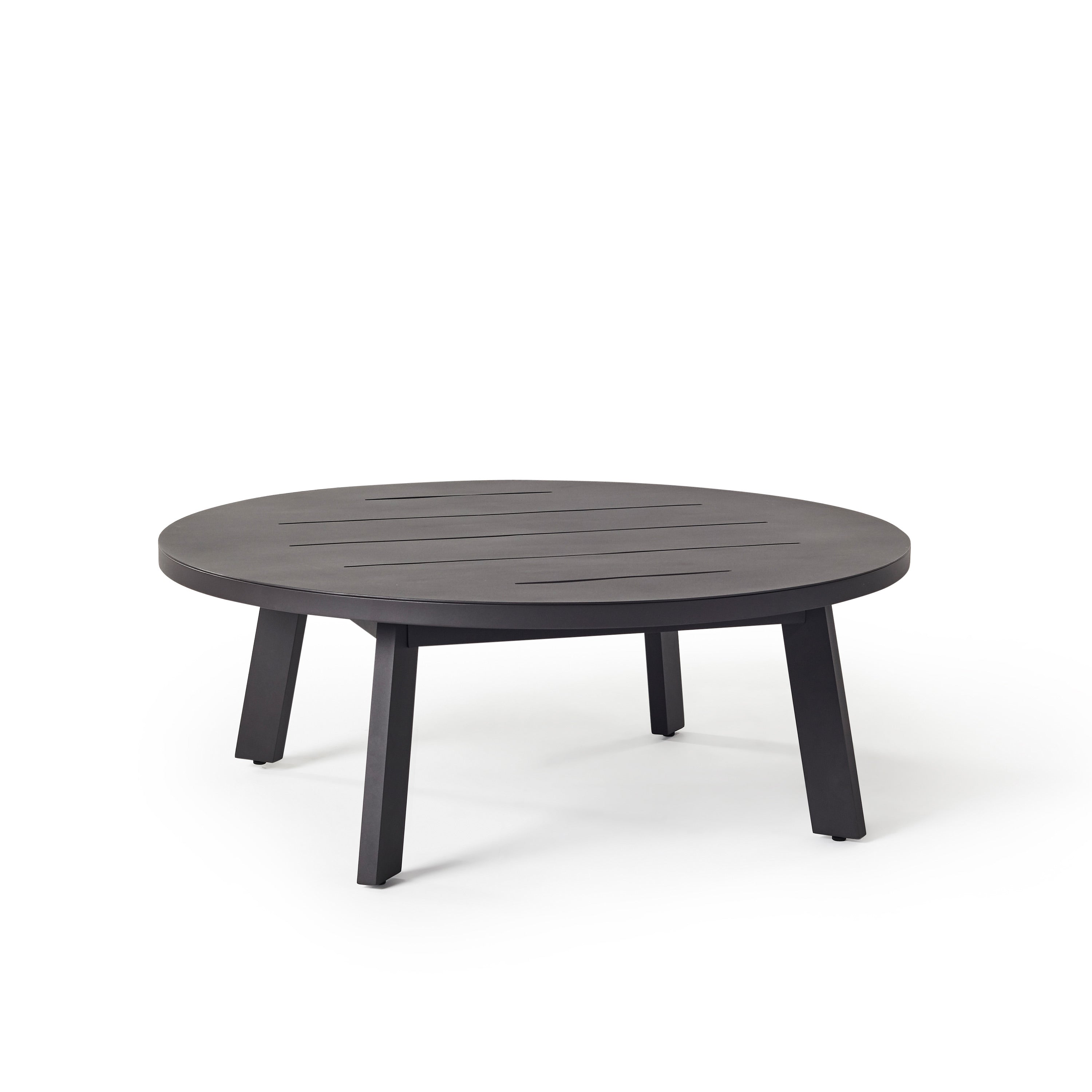 The Cavallo 43" Round Coffee table in Charcoal Aluminum by Terra Outdoor Living is a sleek all-aluminum coffee table, with a round slatted top atop 4 subtly angled straight-edged legs.