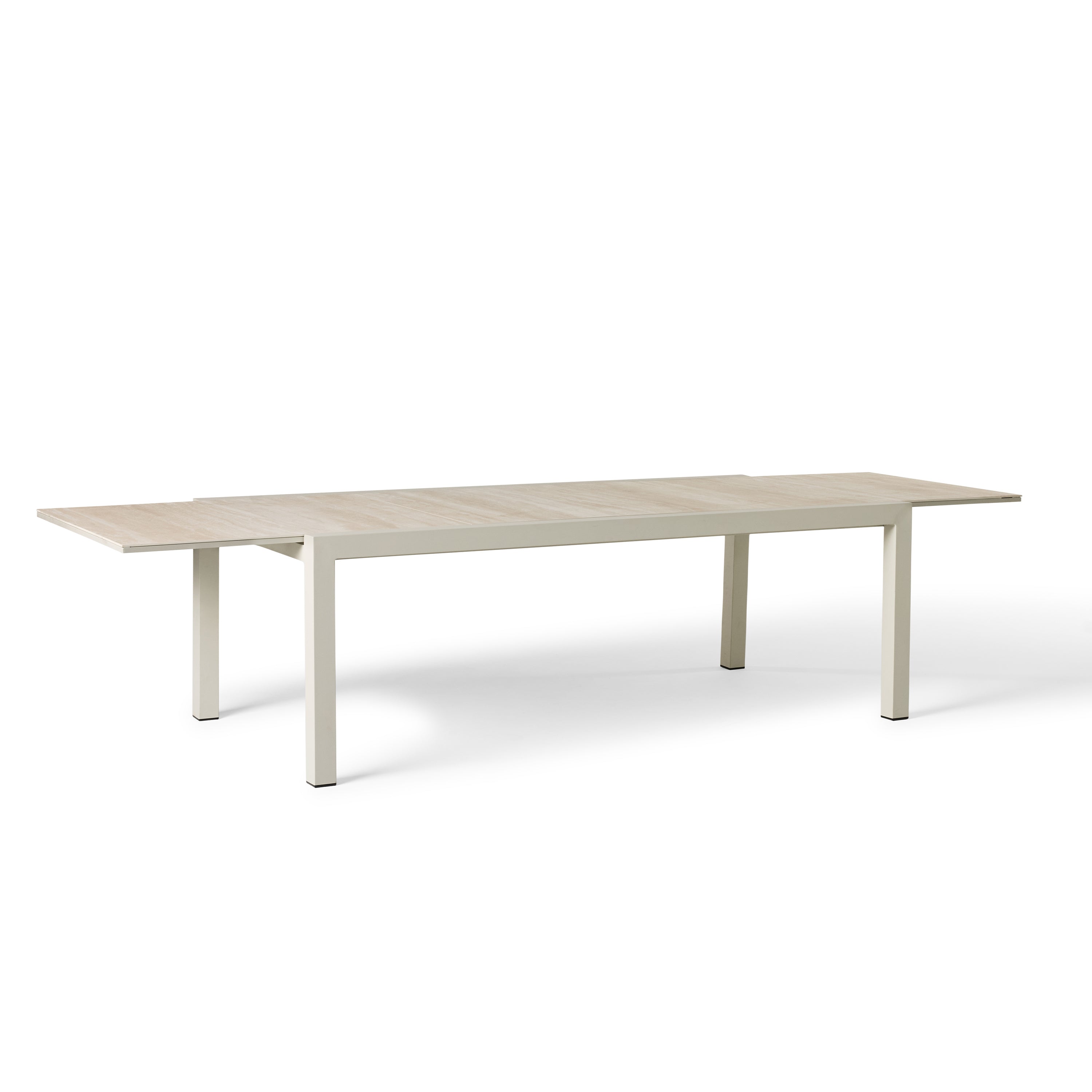 Del Mar Dining Table by Terra Outdoor Living — features an aluminum frame in 'Dune' with a ceramic top; seats up to 12 comfortably and includes a convenient extendable leaf that nests under the table when not in use, perfect for dining and entertaining.