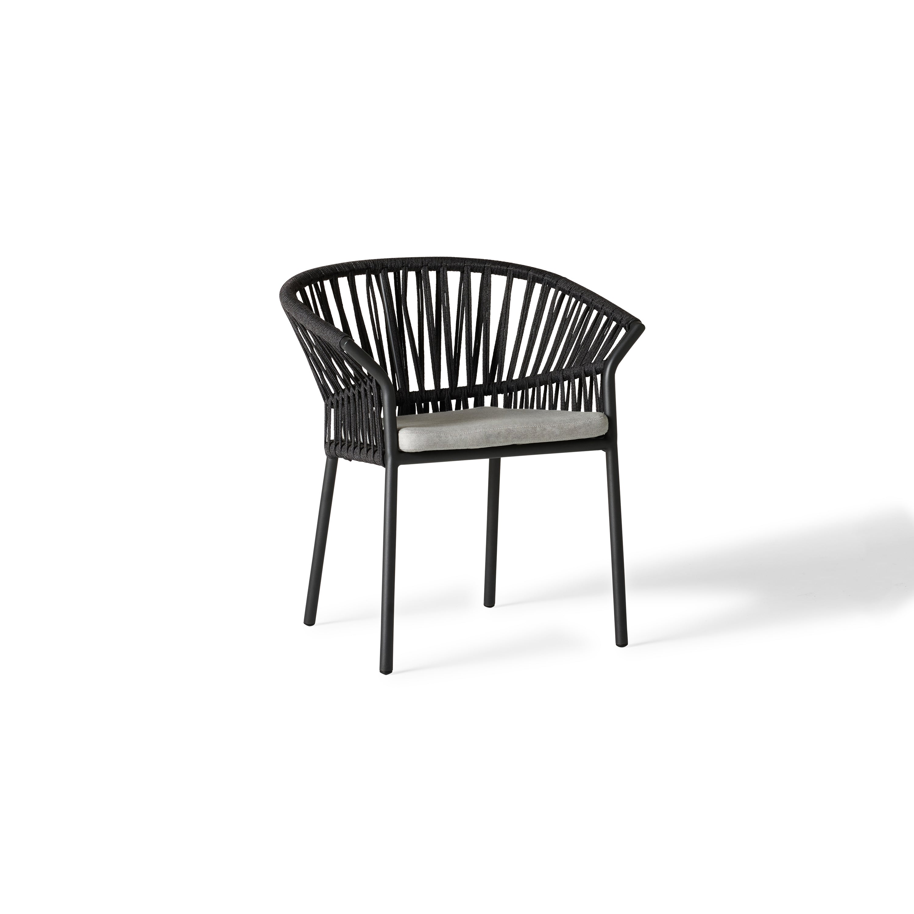 Del Mar Dining Chair by Terra Outdoor Living — features an aluminum frame in 'Charcoal' and black Italian polyolefin rope seat back; includes one seat cushion and one back cushion (not shown in this picture) in weather-friendly fabric, offering low-profile comfort and stylish support, perfect for pairing with the Del Mar Dining Table or any dining table.