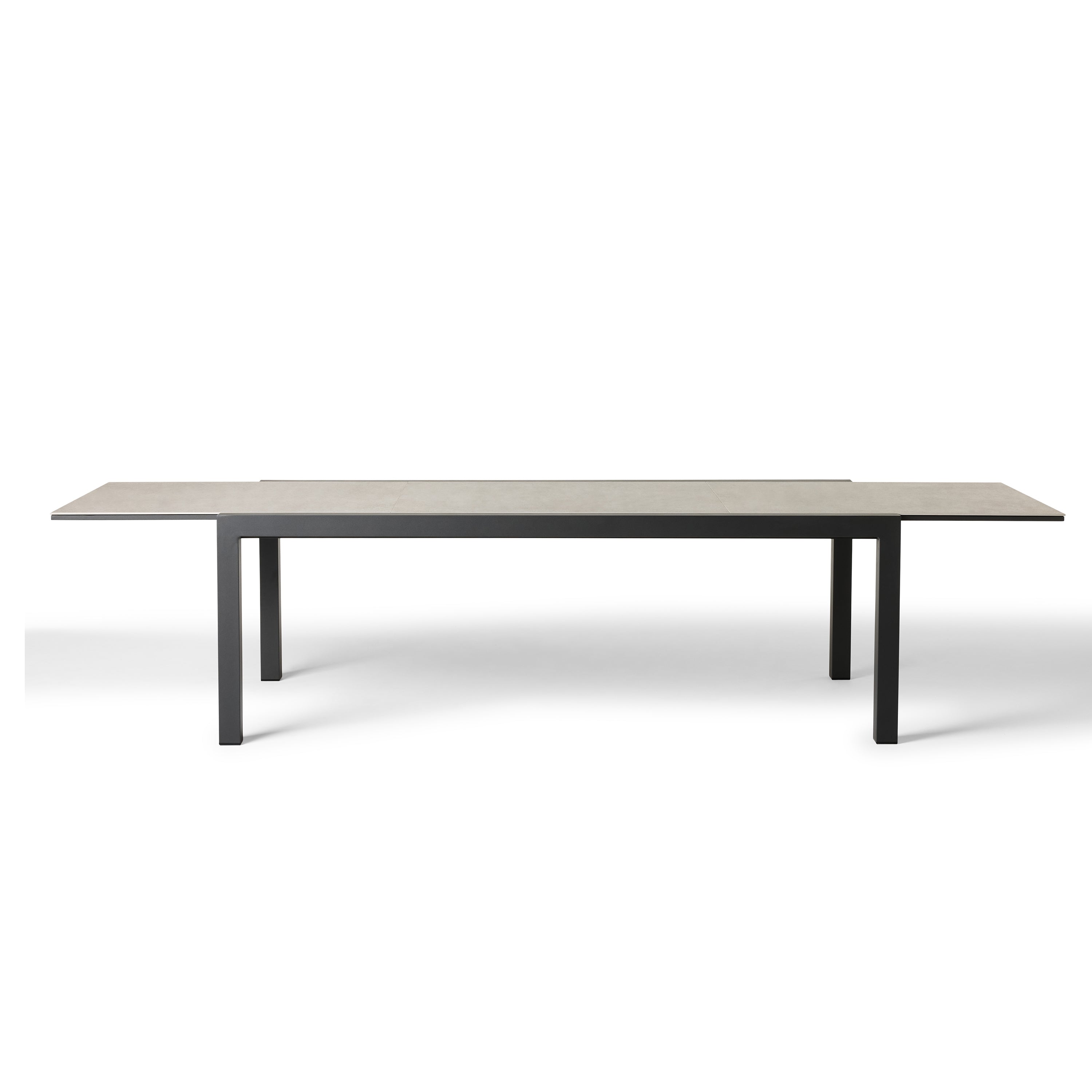 Del Mar Dining Table by Terra Outdoor Living — features an aluminum frame in 'Charcoal' with a ceramic top; seats up to 12 comfortably and includes a convenient extendable leaf that nests under the table when not in use, perfect for dining and entertaining.