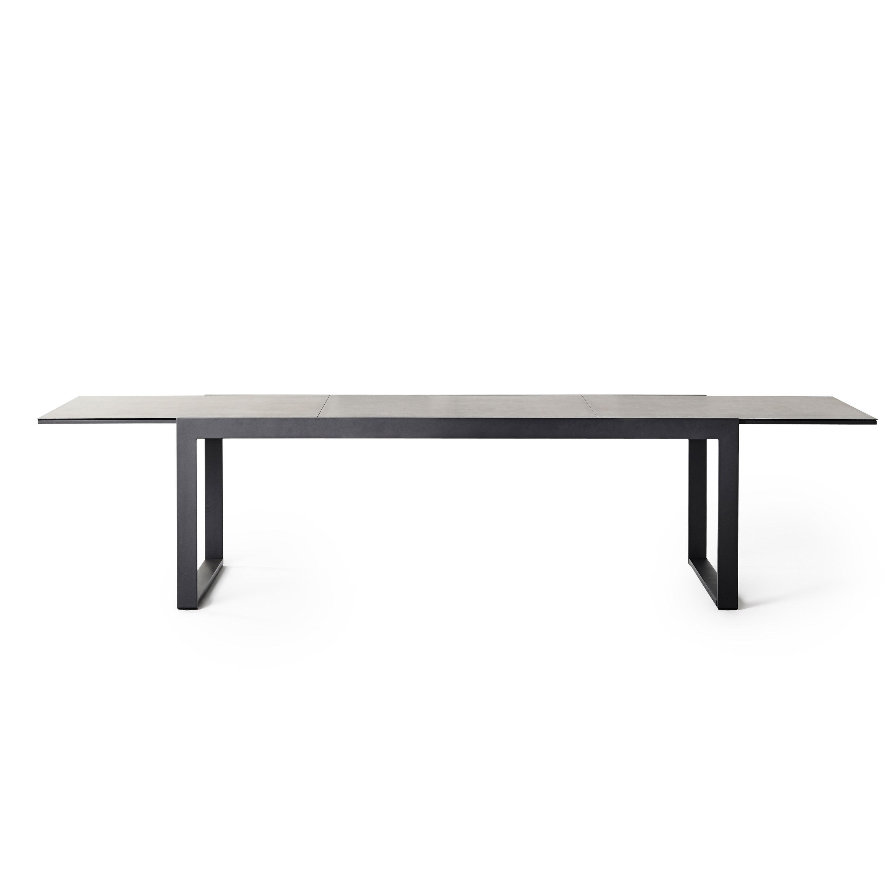 Diablo 87"-130" Extension Dining Table in Charcoal by Terra Outdoor Living is an extension dining table, with sled-style powdercoated aluminum frame and 'ceramic' coated tempered safety glass as the table top. It has a sleek modern look and can extend to suit the moment.