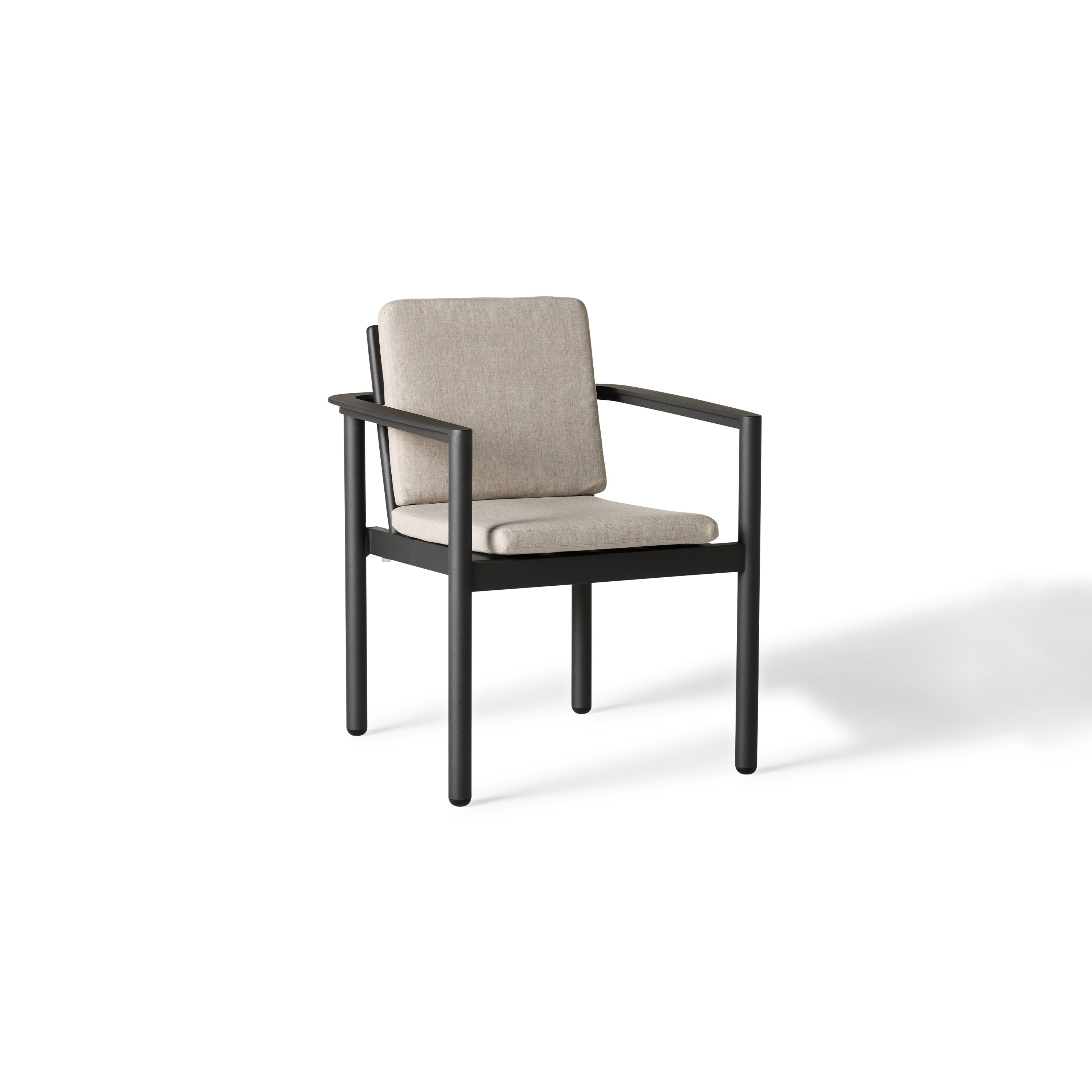 Stinson Dining Chair in Aluminum by Terra Outdoor Living — crafted with a powdercoated aluminum frame in a charcoal finish and Italian rope seat back, featuring gently curved lines and vertical slats for a wraparound silhouette; includes one seat cushion and one back cushion in weather-friendly fabric for lasting outdoor comfort.