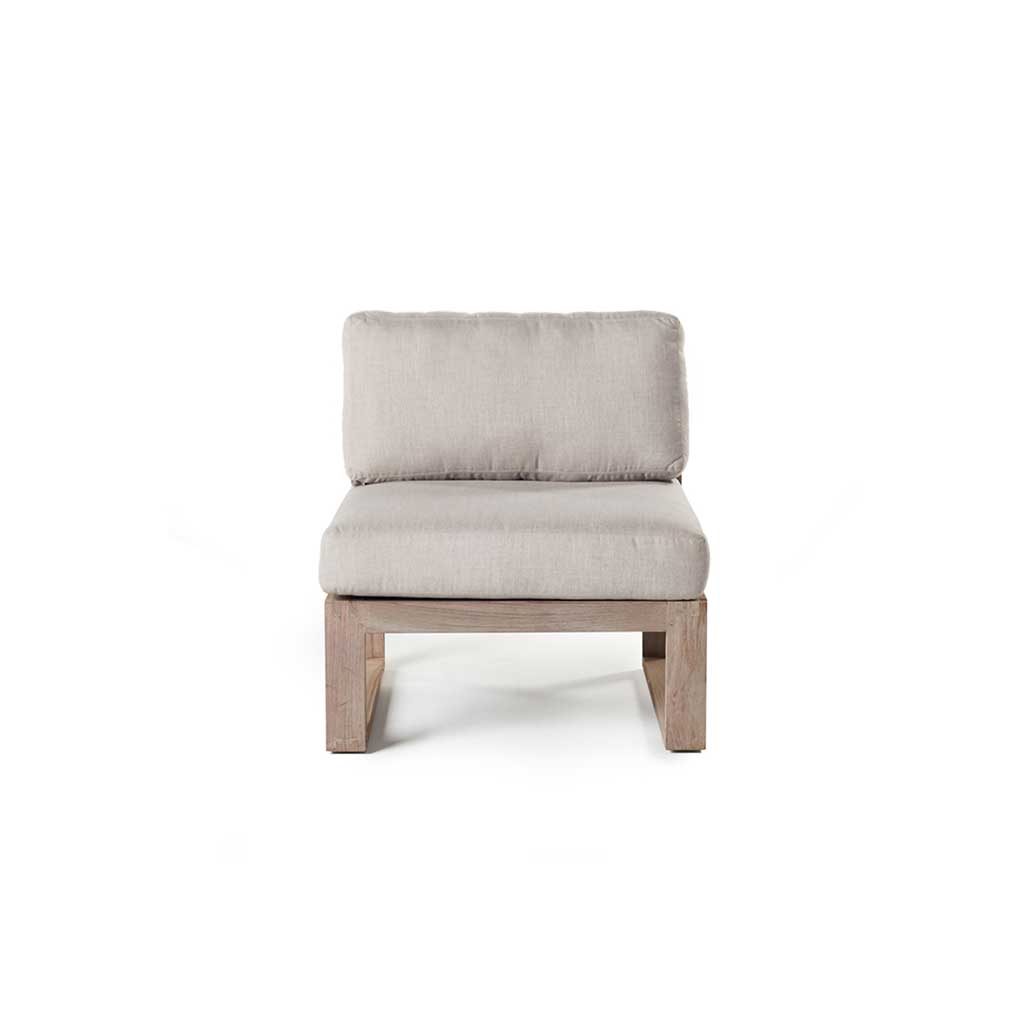 Belvedere Sectional Armless Chair in Weathered Teak by Terra Outdoor Living is a deep-seating armless chair with Sunbrella® cushions and a low-profile teak frame with a weathered finish designed for modular outdoor configurations.